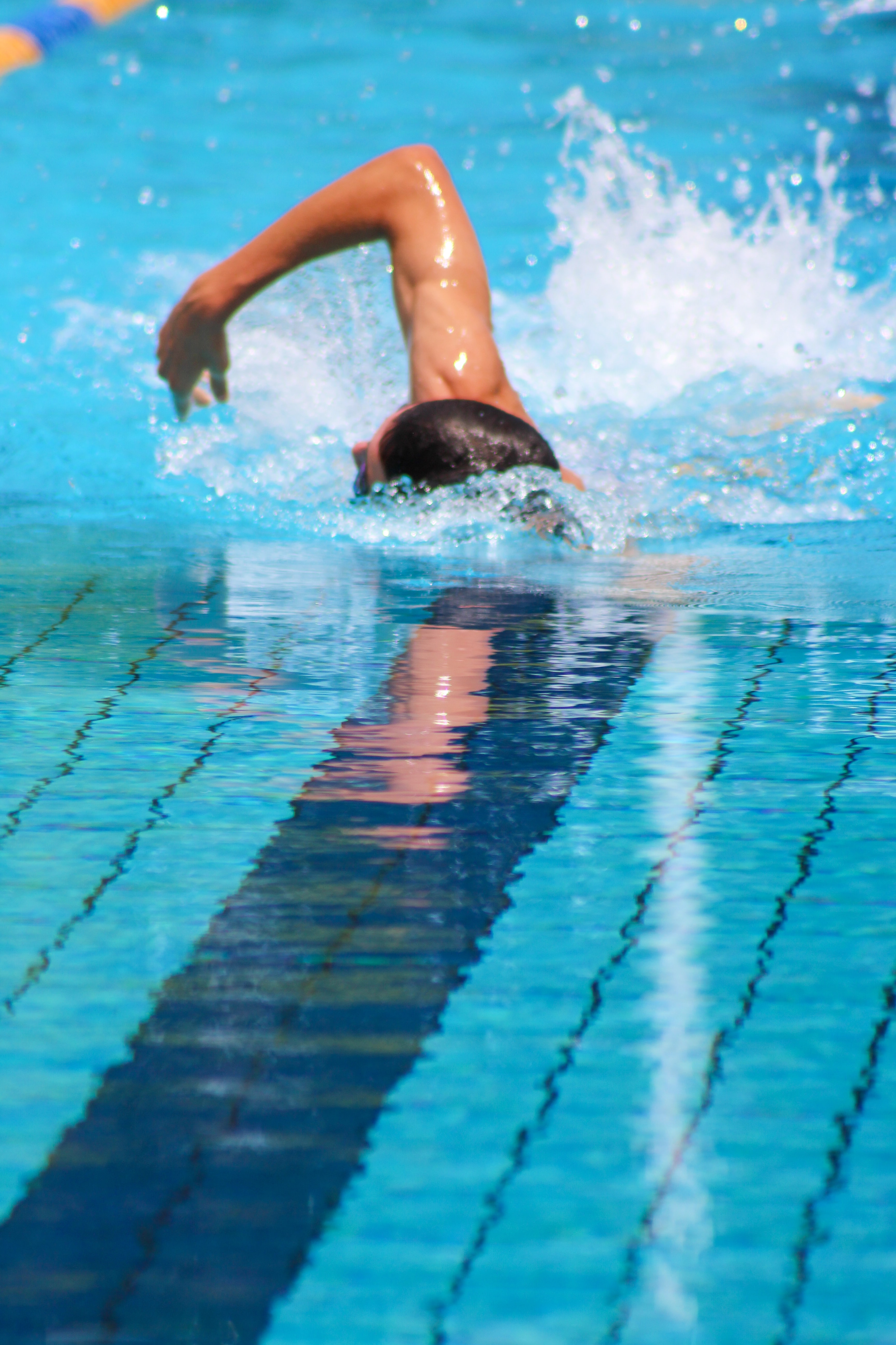 An athlete swimming the front crawl
